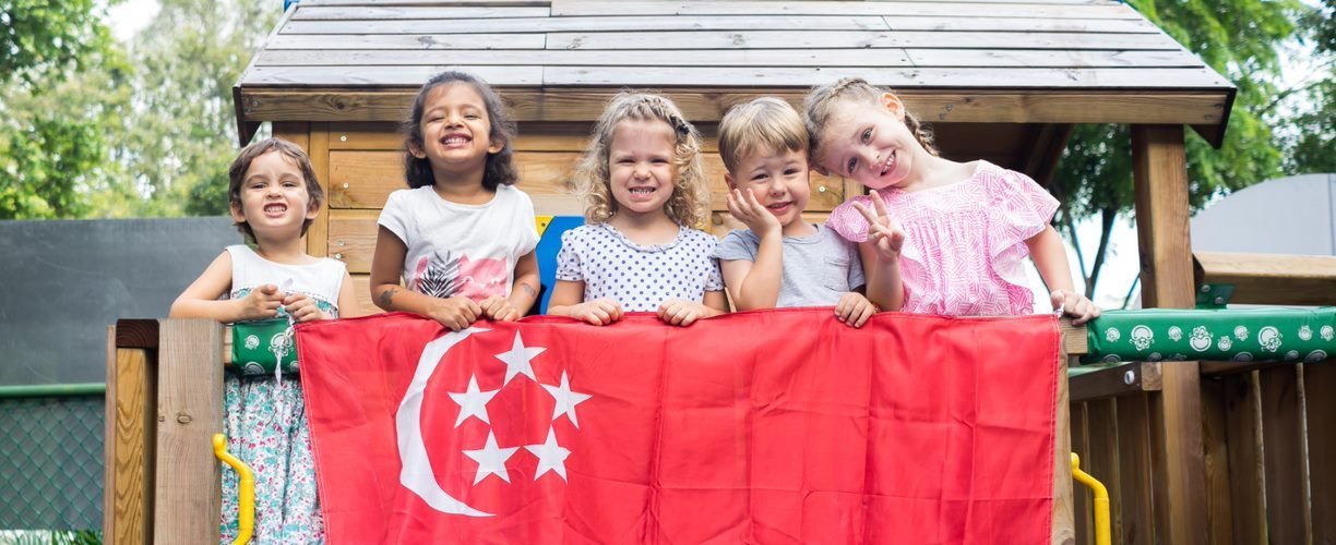 singapore-national-day-children-with-flags-2.jpg